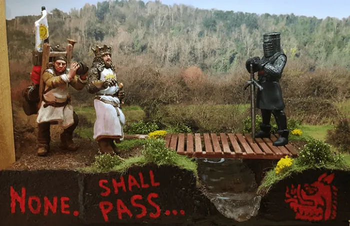 Intricately designed miniature medieval knights diorama with detailed scenery