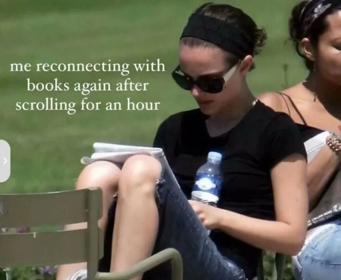 Woman reconnecting with books after scrolling for an hour outdoors