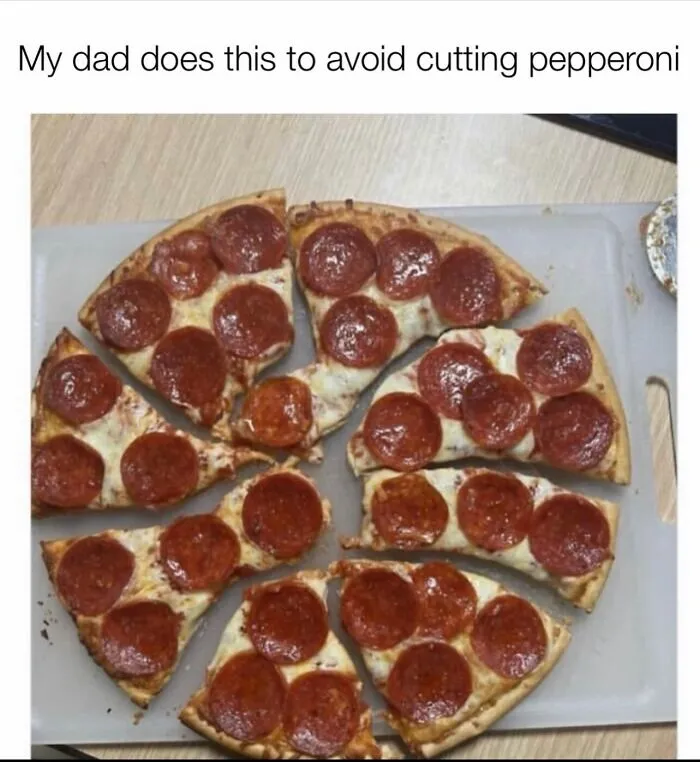 Pepperoni pizza sliced around toppings as part of funny random photos