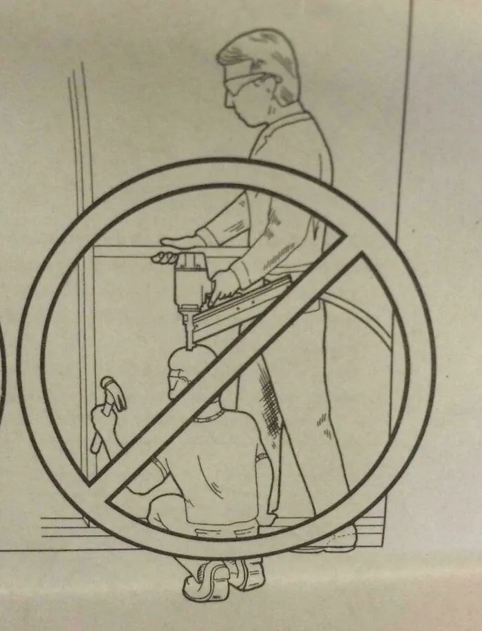 Confusing instructions diagram showing a man aiming a nail gun at another person's head