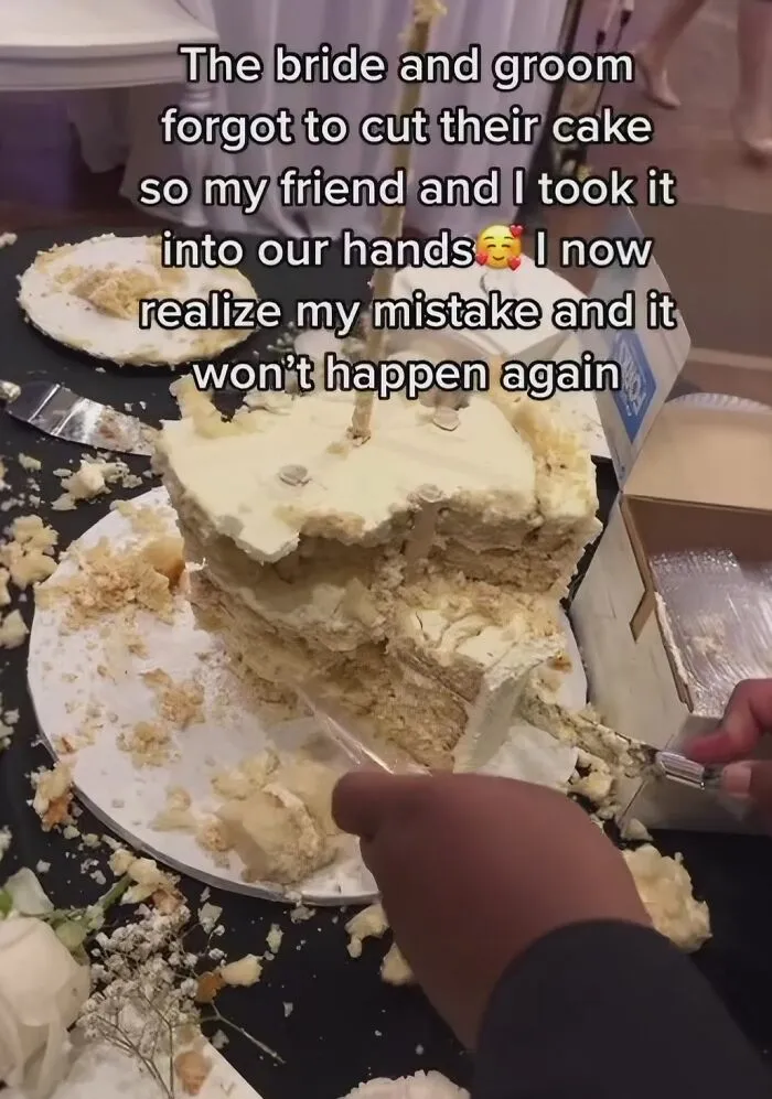 Hands grabbing cake at a wedding where guests took cake before bride and groom cut it