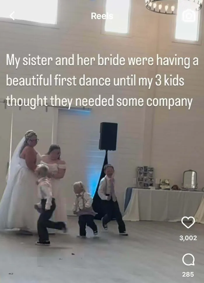 Children interrupt bride and her bride's first dance seeking company at wedding