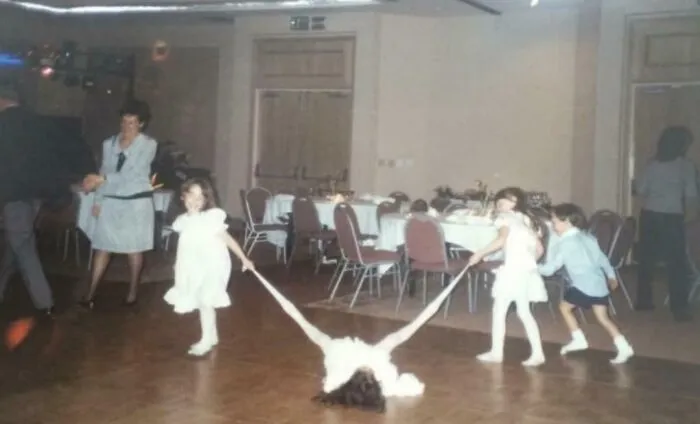 Kids playing roughly at wedding reception making the day about themselves