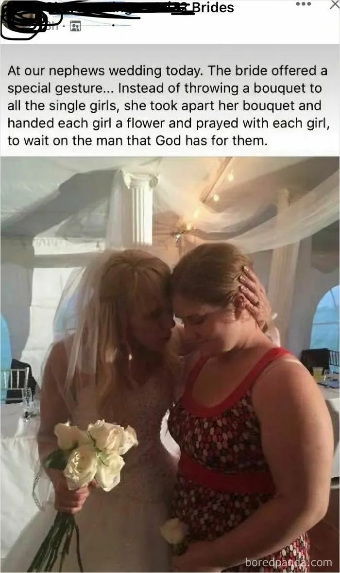 Bride prays with each single girl at wedding instead of bouquet toss, holding white roses bouquet