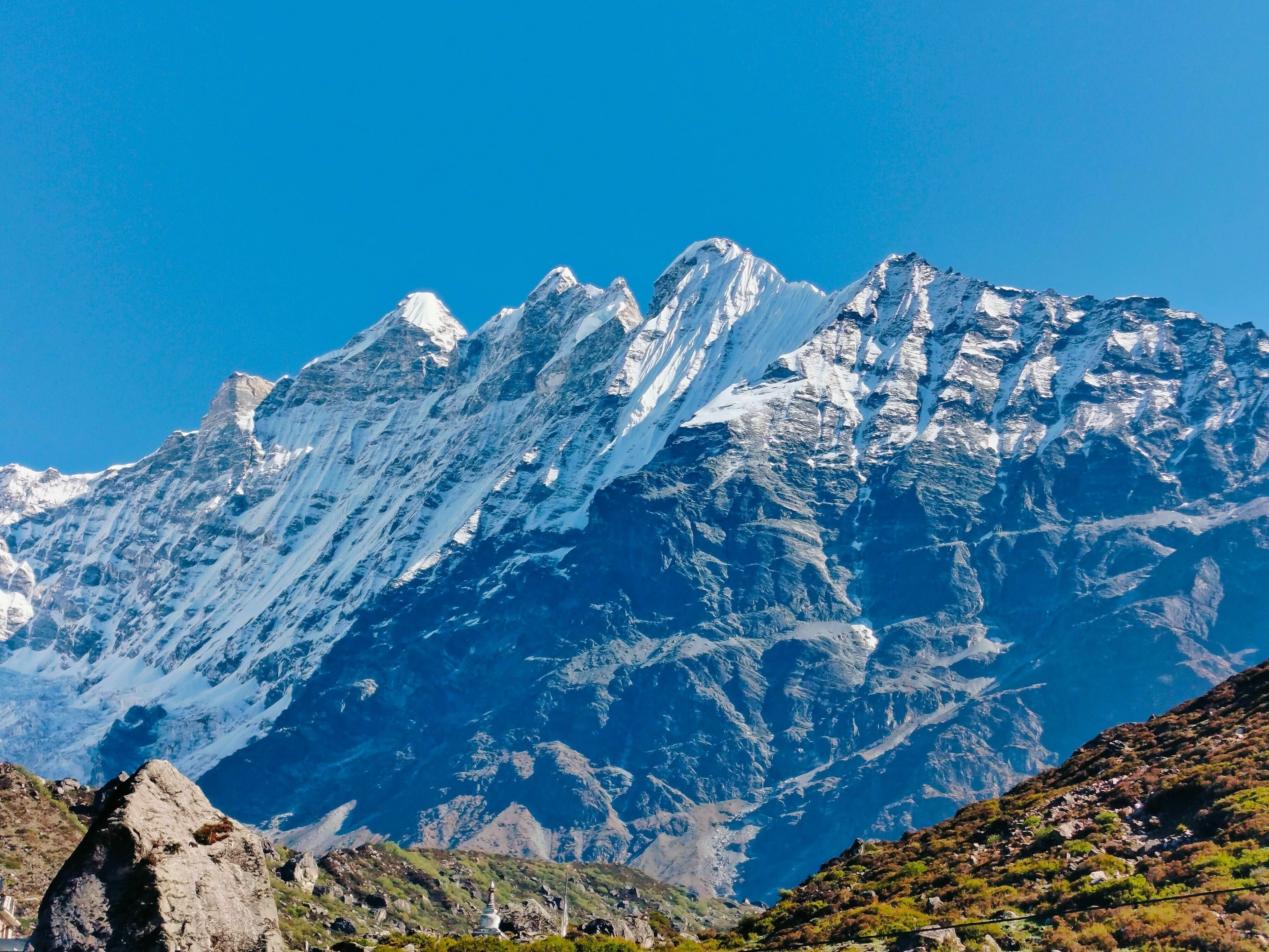 Capital city in Himalayan foothills valley covered in snow