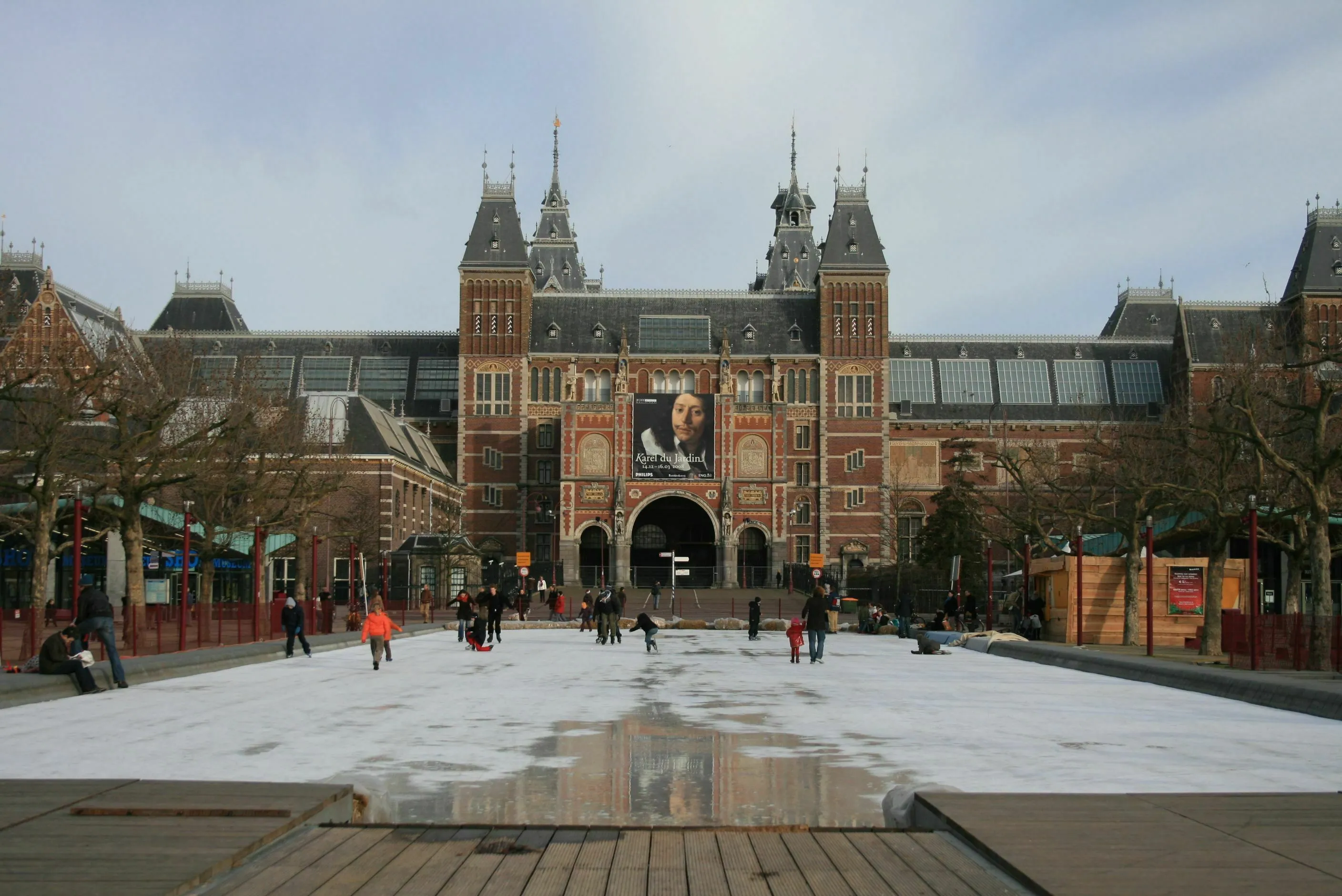 Amsterdam canals and Rijksmuseum with visitors near Anne Frank House