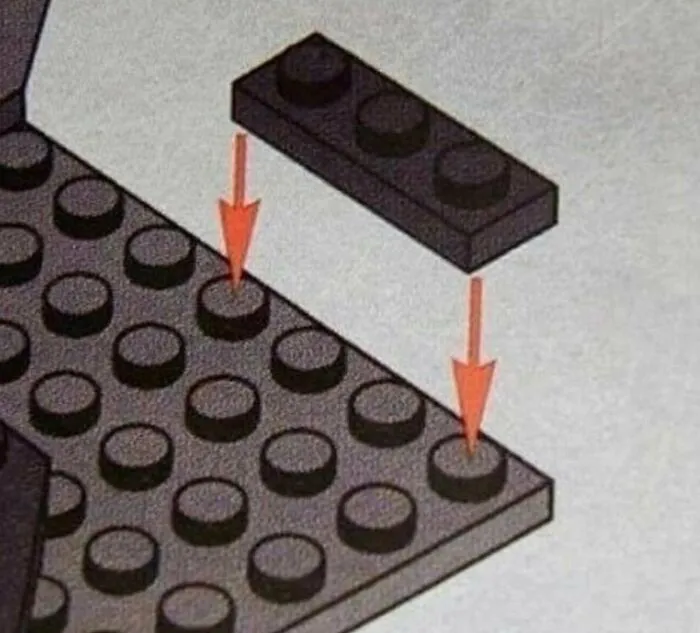 A toy brick diagram displaying confusing instructions for placing a piece onto a baseplate with red arrows.