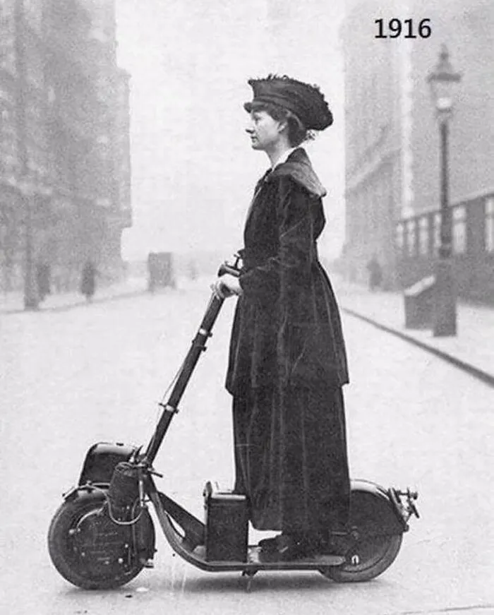 Vintage 1916 photo of a woman riding an early motor scooter revealing cool history facts