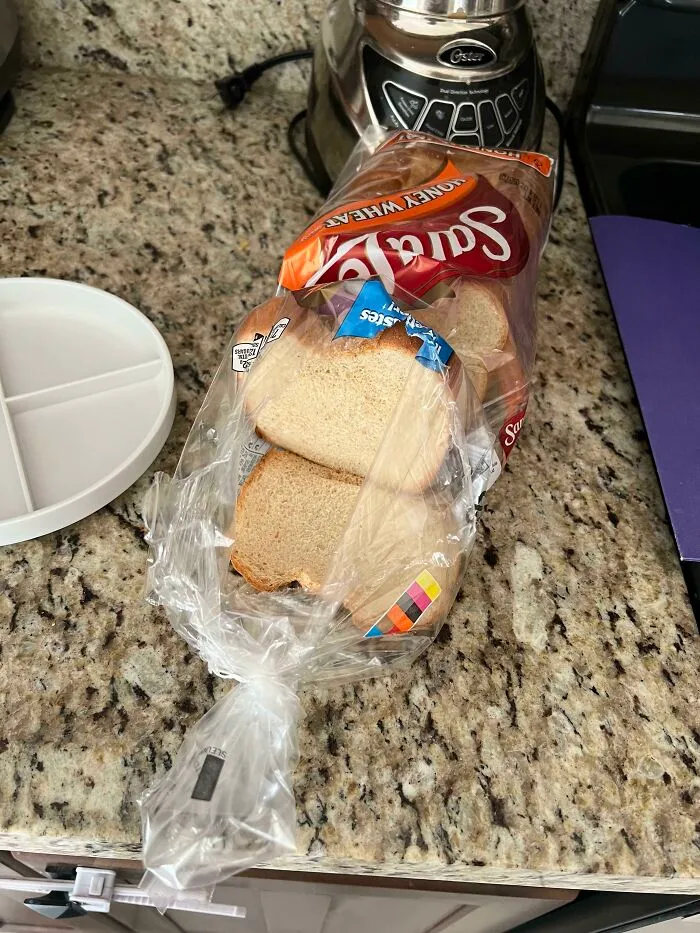 Plastic bag of bread left open on a kitchen counter showing annoying things partners do.