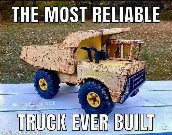 A rusty toy dump truck on a bench, featured in funny cringe construction fails memes.