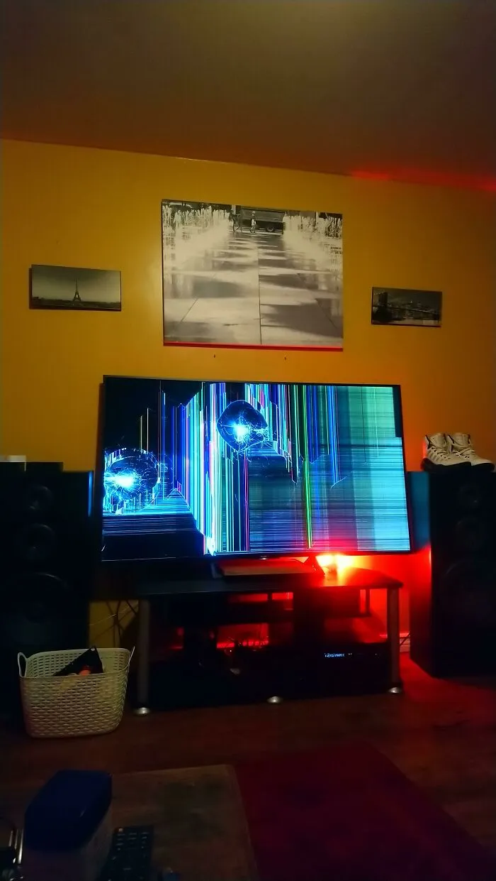 Smashed TV screen sitting on a stand showing things partners do that drive people insane.