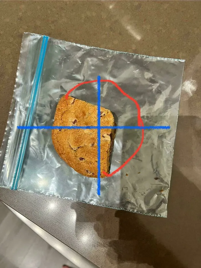 Single half-eaten cookie left in a plastic bag by a partner