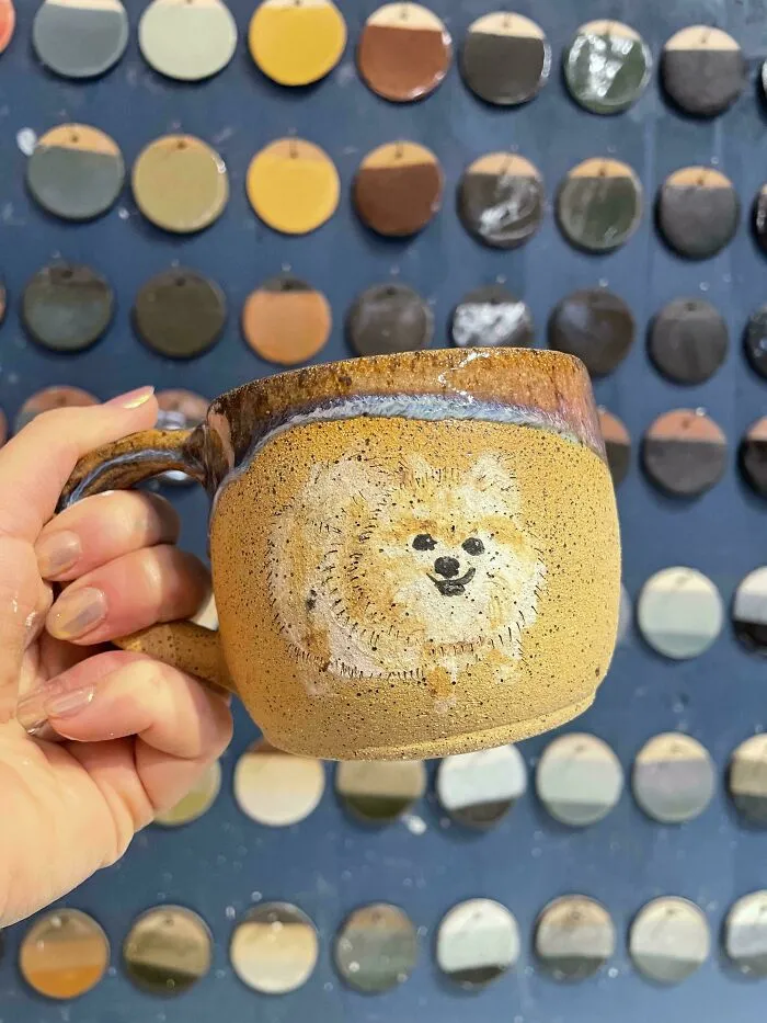 Handcrafted ceramic mug with a cute dog painting