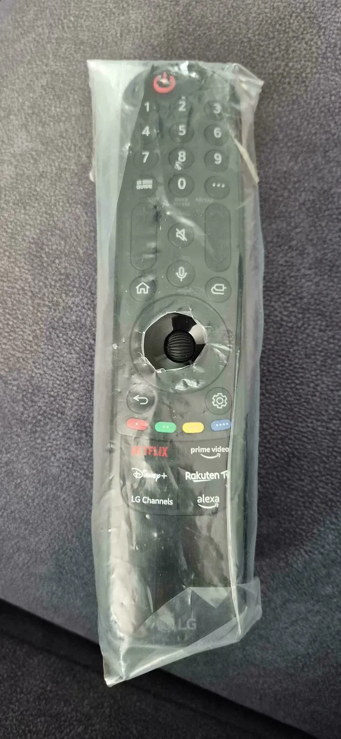 TV remote left wrapped in its original plastic packaging, showing annoying things partners do.