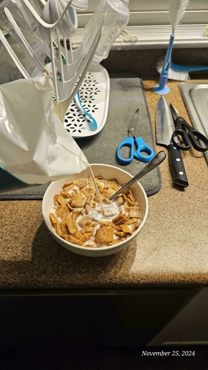 Milk pouring into cereal bowl on kitchen counter, showing annoying things partners do.