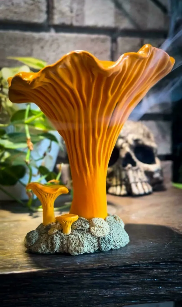 Yellow mushroom-shaped incense burner crafted as a pottery creation