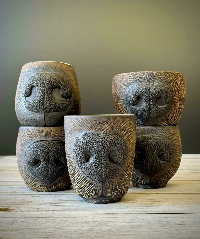 Set of ceramic cups shaped like animal snouts showing beautiful pottery creations