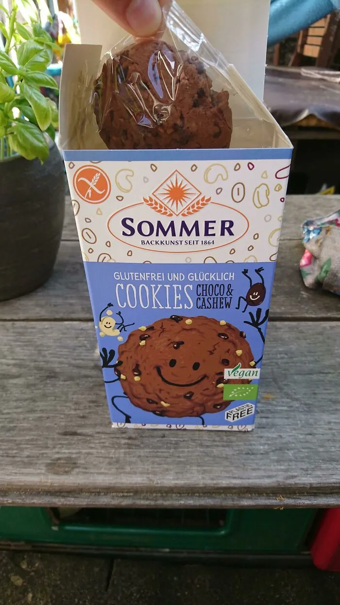 Overly tall cookie box with misleading empty space showing bad packaging fails