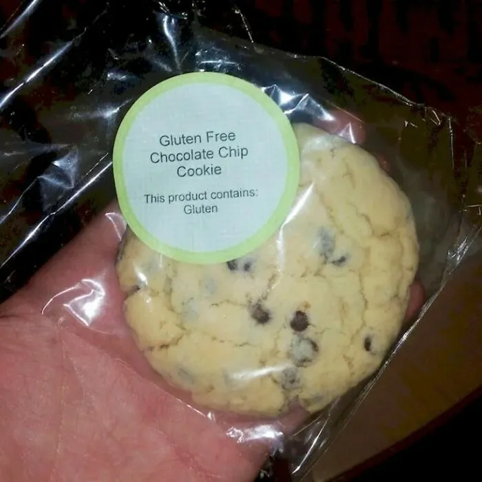 A chocolate chip cookie labeled gluten free while the ingredients list contains gluten, showing bad packaging fails.