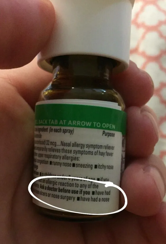 A nasal spray bottle warning label showing cut-off text, highlighting funny packaging fails.