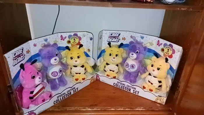Two sets of Care Bears toys showcasing bad packaging fails in stores