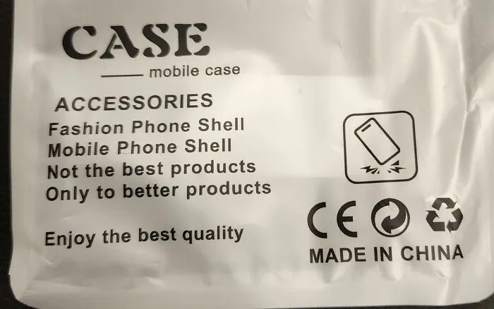Mobile case package printed with humorous translation errors illustrating bad packaging fails.