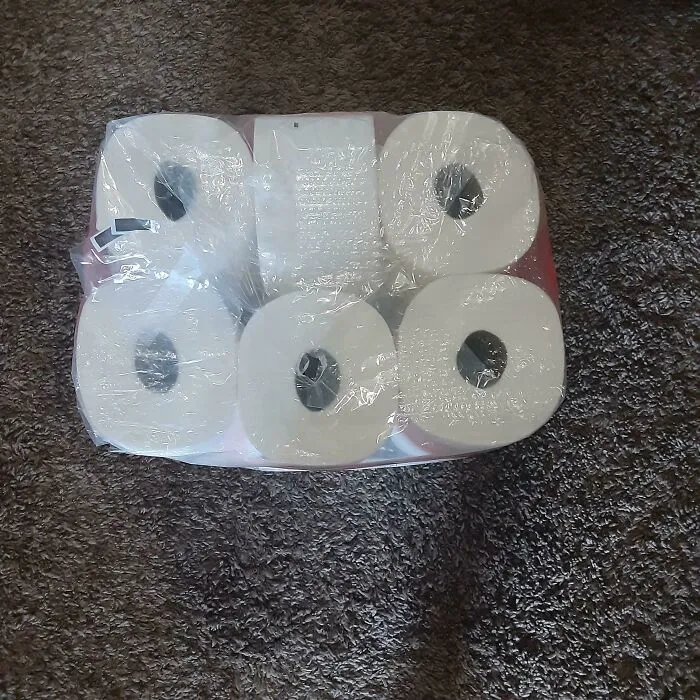 Pack of toilet paper wrapped in plastic, an example of packaging fails.