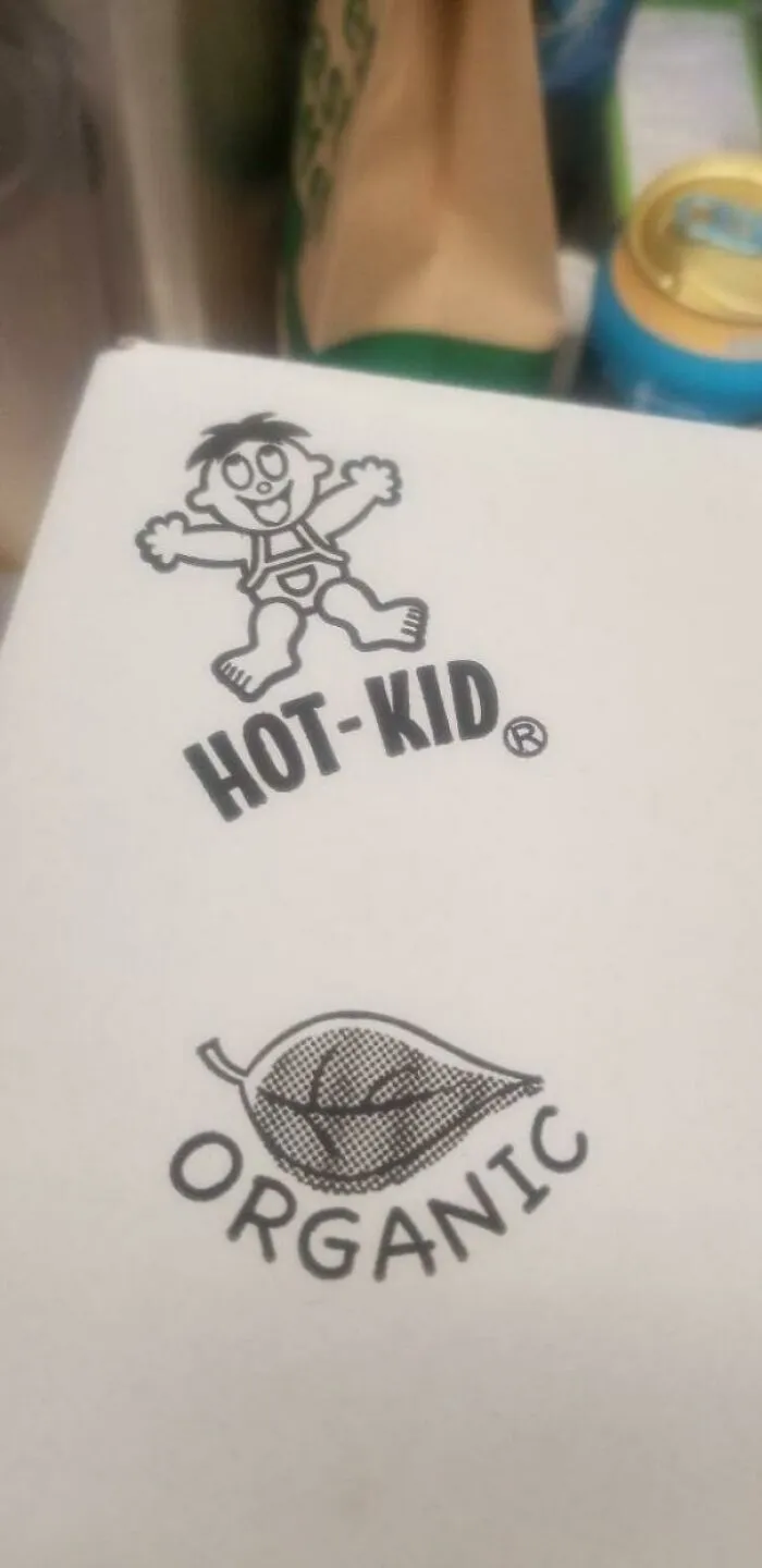 An awkward logo printing with Hot-Kid text on a package, highlighting funny packaging fails.
