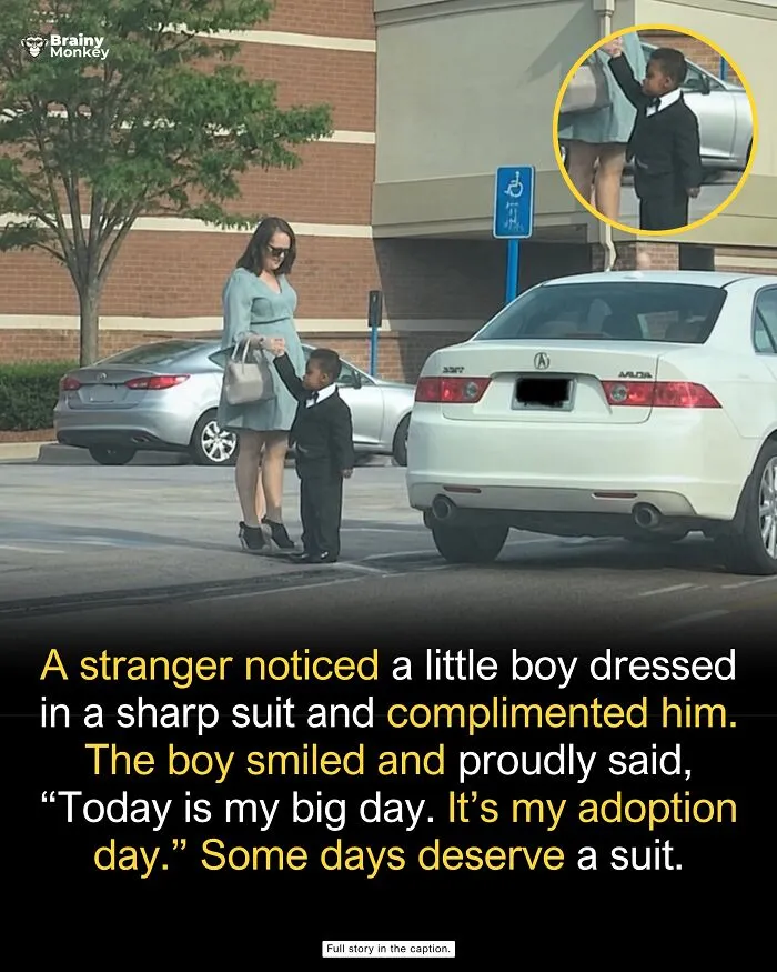 Little boy in a suit holding hands with a woman on his adoption day, sharing wholesome facts.