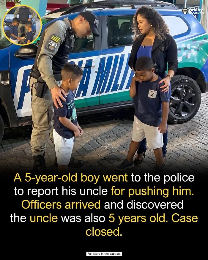 A police officer interacts with two young boys beside a patrol vehicle, representing wholesome facts.
