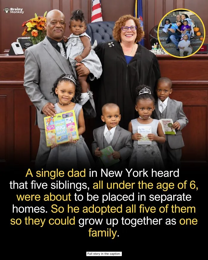 Proud single father standing with his five newly adopted children, featured in wholesome facts.