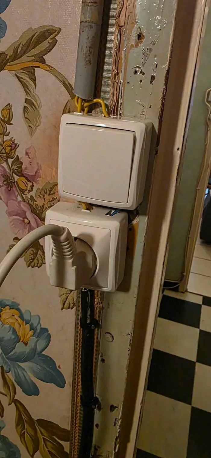Dangerous electrical outlet and light switch wiring nightmare showing hilarious construction fails.