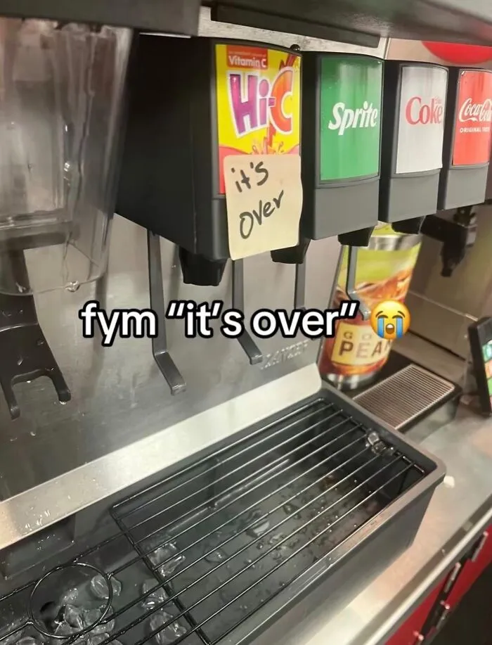 A hilarious real life meme of a soda fountain machine with an it is over note attached to it