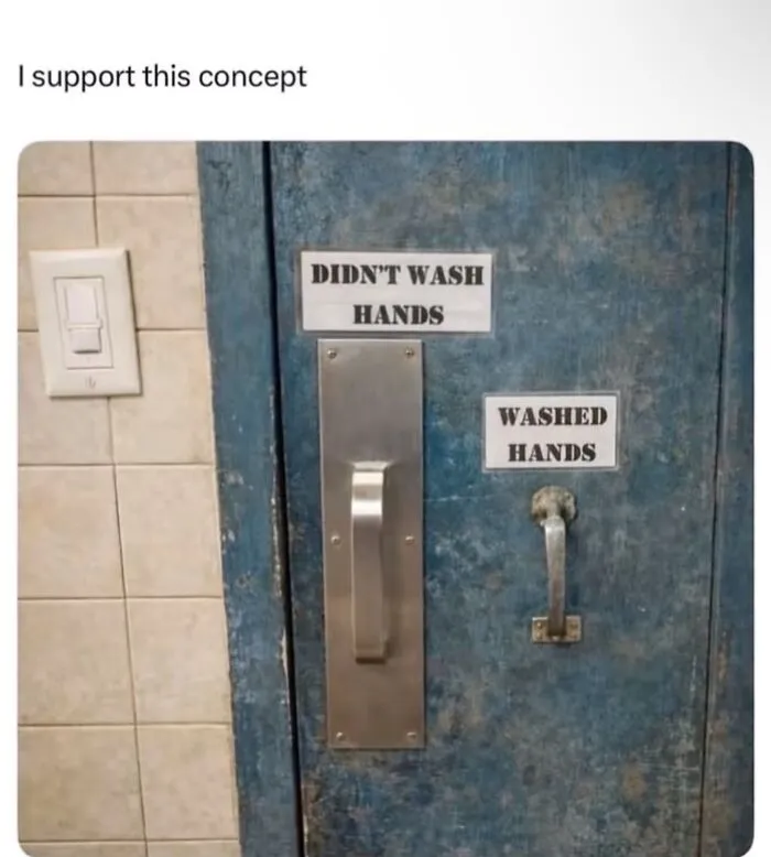 Restroom door with separate handles for washed and unwashed hands, showcasing hilarious memes from daily life.