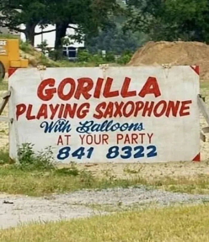 A funny billboard sign advertising a gorilla playing saxophone at your party