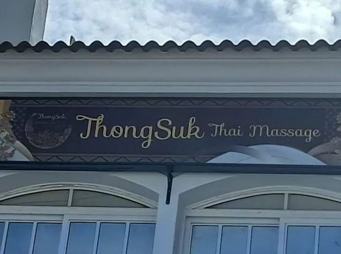 Hilarious ads and signs featuring a store sign for ThongSuk Thai Massage