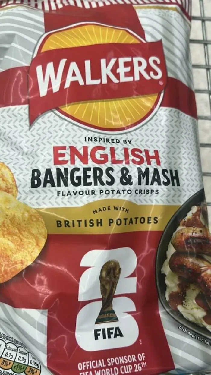 Hilarious ads: a bag of Walkers crisps featuring a funny placement of the World Cup trophy in the design.