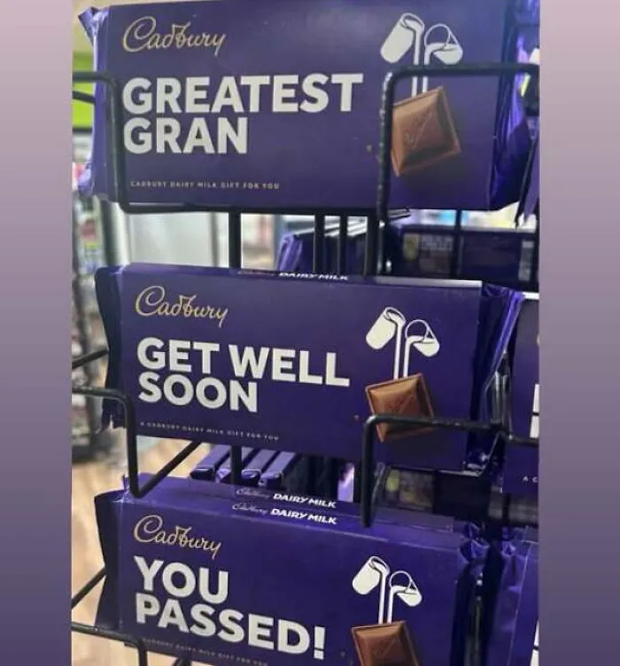 A hilarious placement of Cadbury chocolate bars reading Greatest Gran, Get Well Soon, You Passed