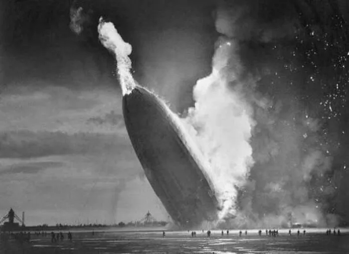 Black and white image of the Hindenburg airship disaster explosion