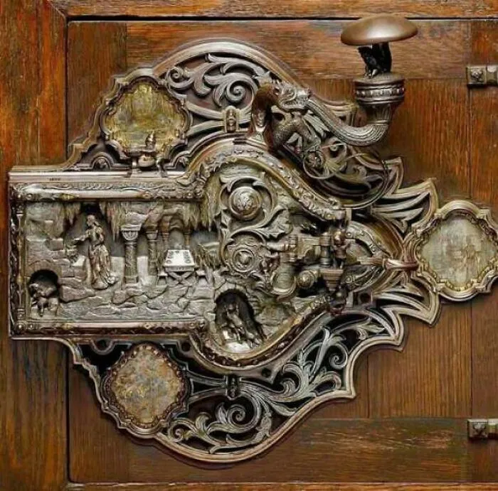 Intricately carved historical wooden door with detailed designs