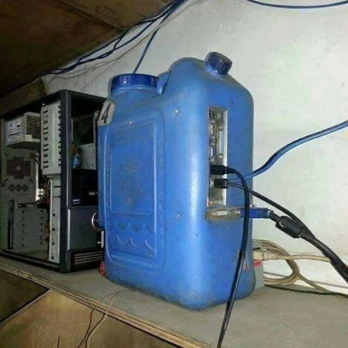 Blue plastic gas container repurposed as a computer tower case showcasing Slavic engineering.
