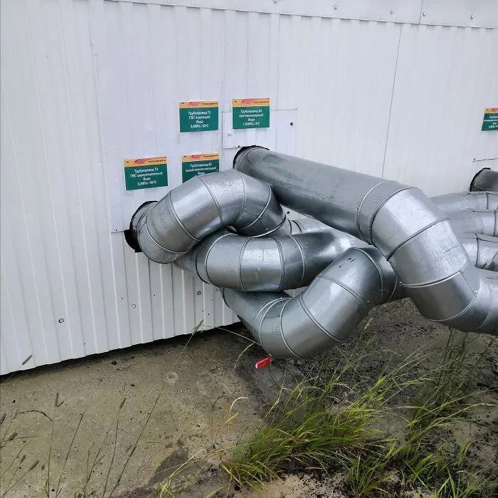 Metals pipes tangled together into a tight knot, a bizarre example of Slavic engineering.