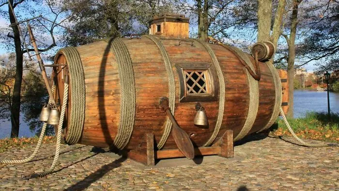 A large wooden barrel converted into a boat or shelter, highlighting unconventional Slavic engineering.