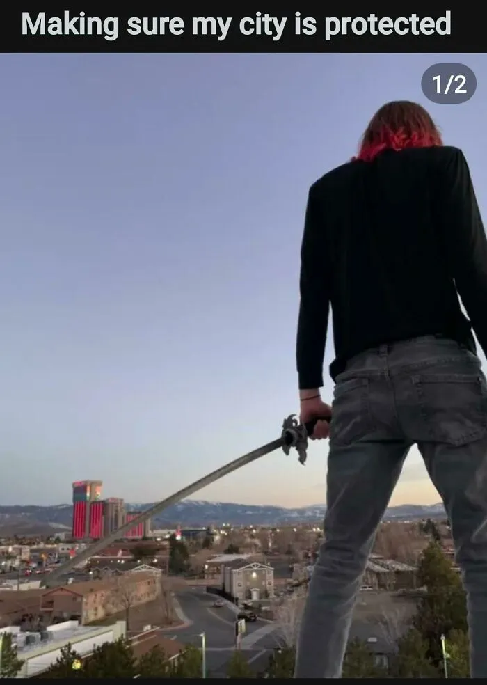 Person holding sword overlooking city claiming to protect it