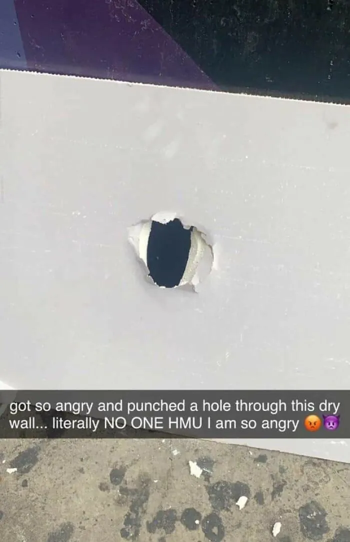 Person punched a hole through drywall showing anger online