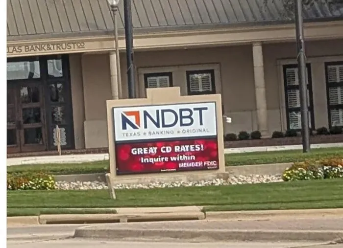 Confusing bank sign layout with unclear logo and text placement