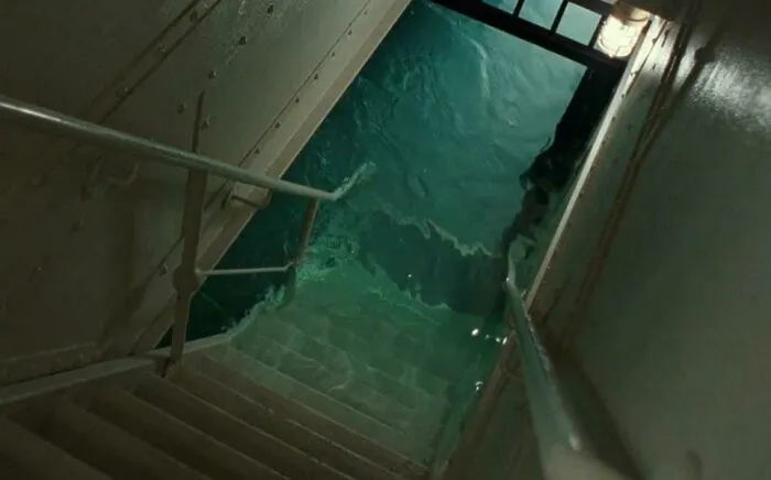 Flooded staircase leading to water in a deep-water submerged environment