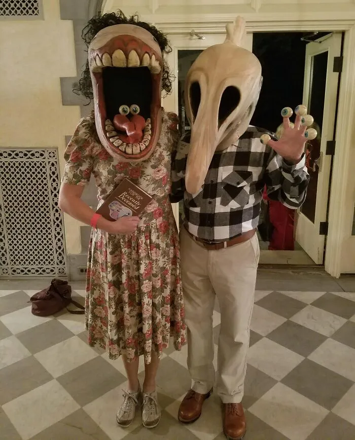 A couple in Beetlejuice monster masks showing funny cool Halloween couples costumes