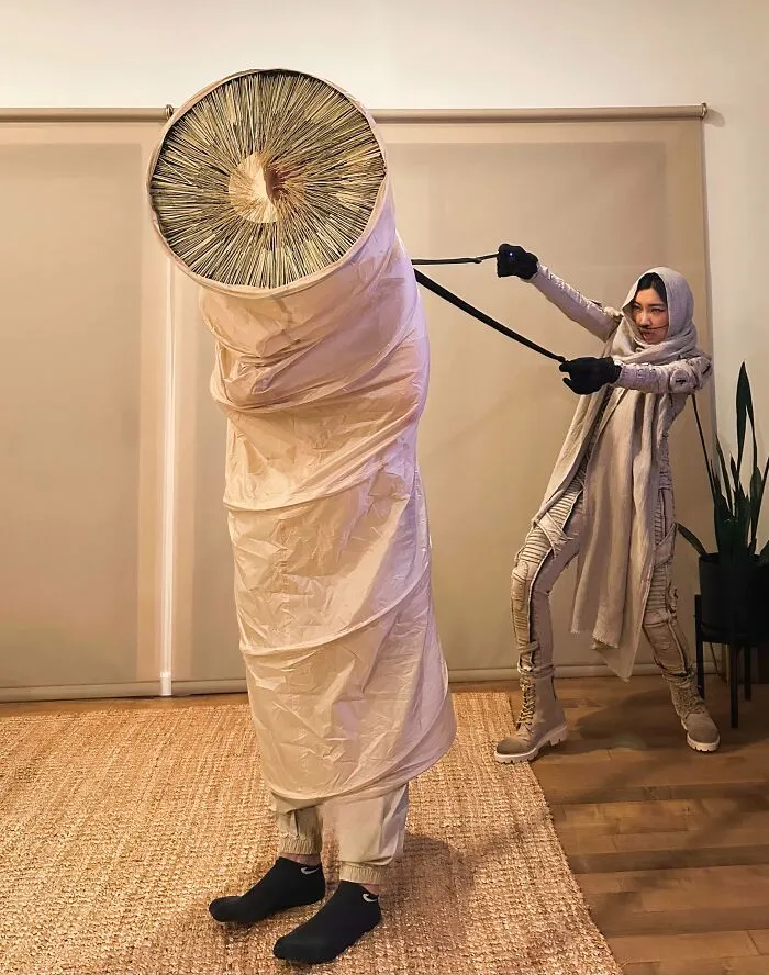 Dune-inspired sandworm and Fremen outfit as creative cool Halloween couples costumes.