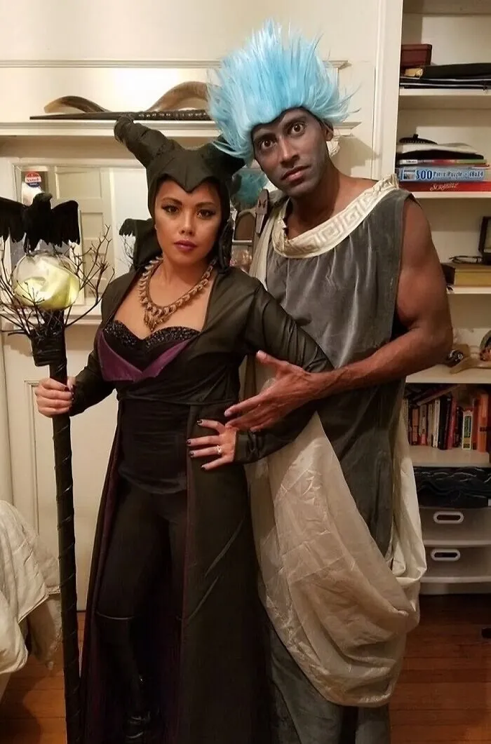 Couple dressed up as Maleficent and Hades as cool halloween couples costumes